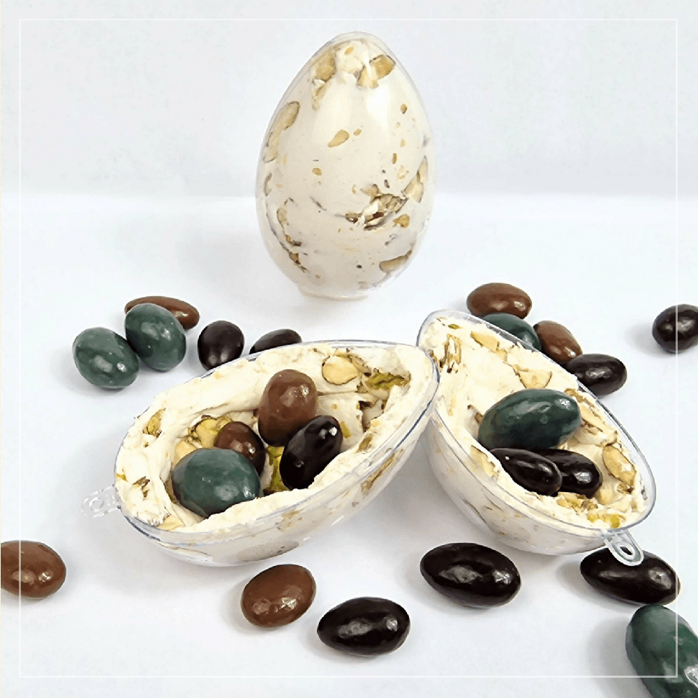 Vue intérieure d'un œuf de Pâques Arnaud Soubeyran : coque en nougat de Montélimar et cœur d'amandes aux trois chocolats